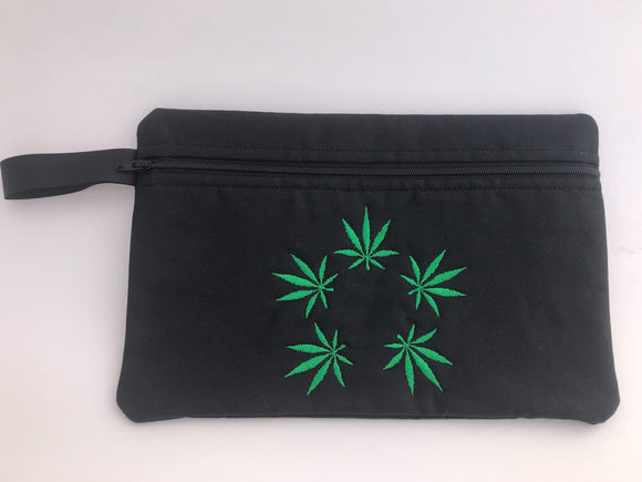 Zippered bags and totes designed, embroidered and hand made by me, featuring bright green marijuana leaves in different patterns